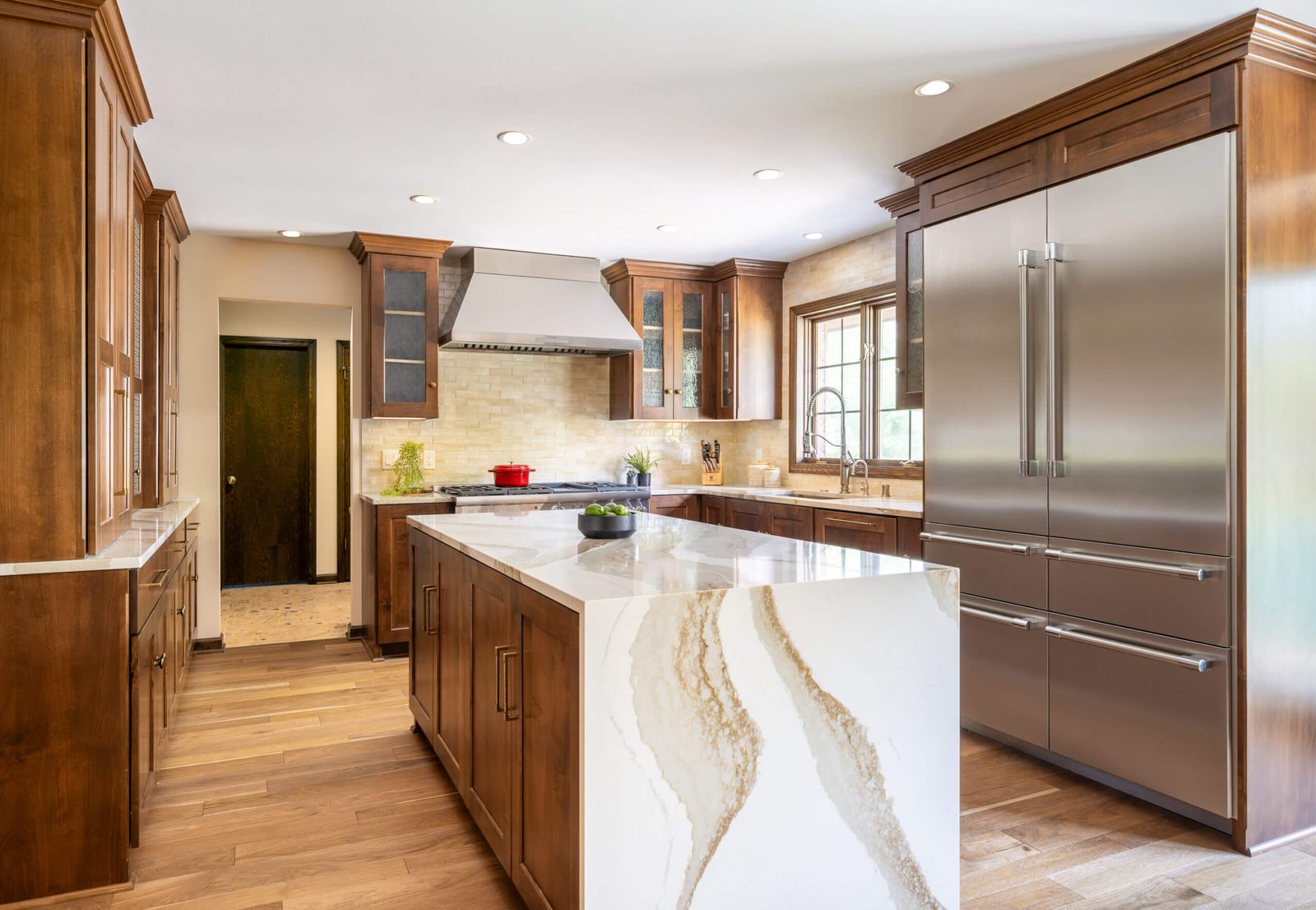 Walnut kitchen with Cambria waterfall island