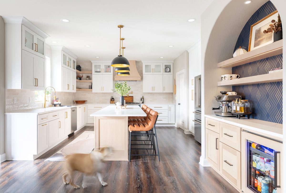 White kitchen remodel with island seating