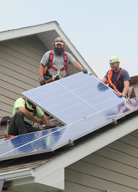 Benson Electric team installing solar panels