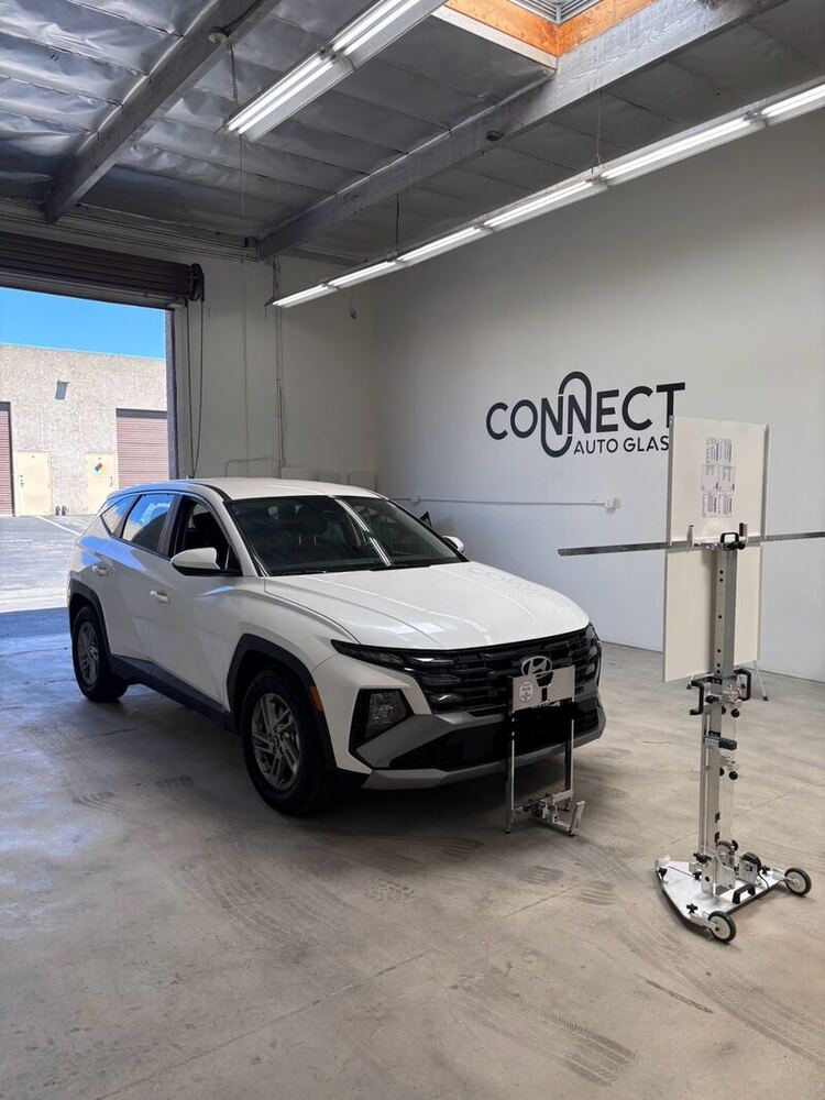 Hyundai Tucson set up for ADAS camera calibration in the Connect Auto Glass shop