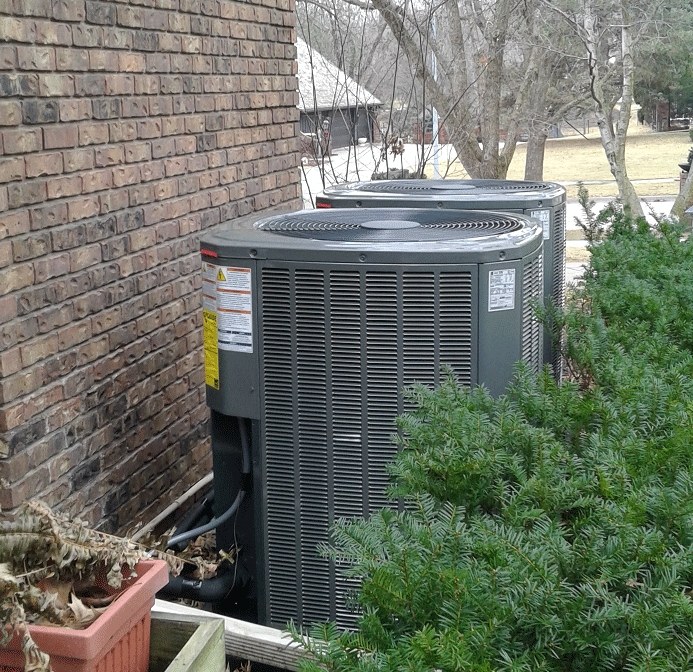 Dual outdoor AC condenser installation