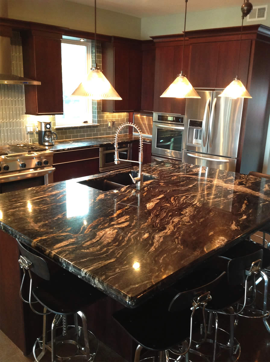 Dramatic red and black granite island countertop