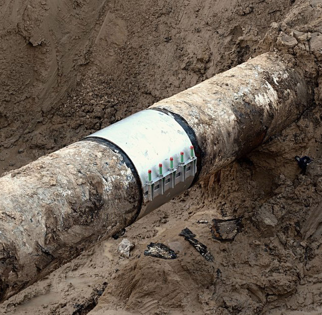 Excavated sewer mainline being replaced