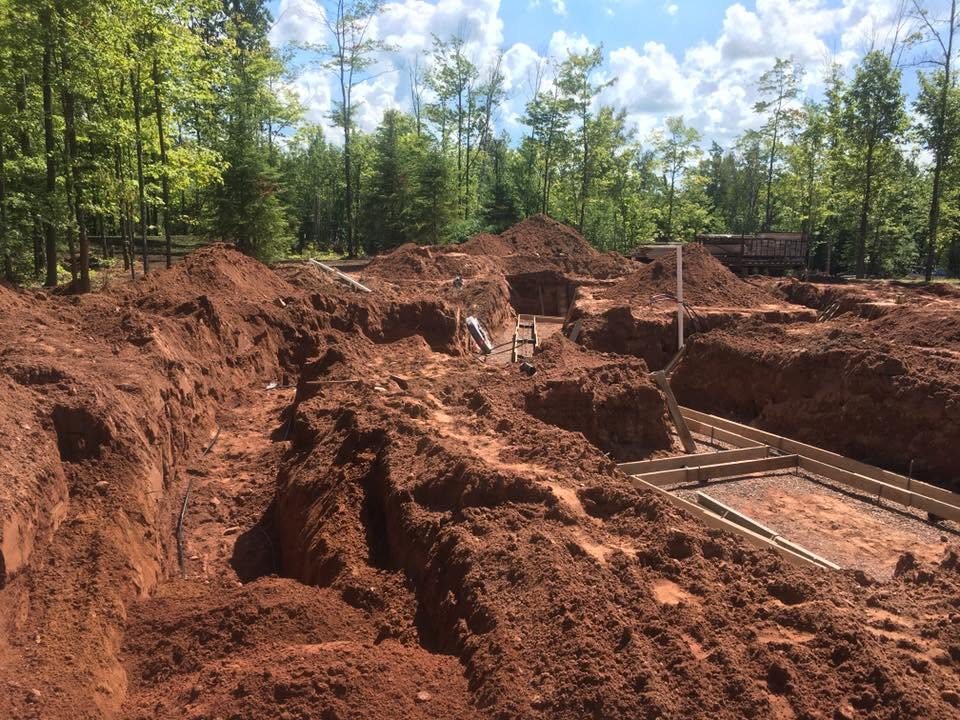 Foundation excavation with footings staked