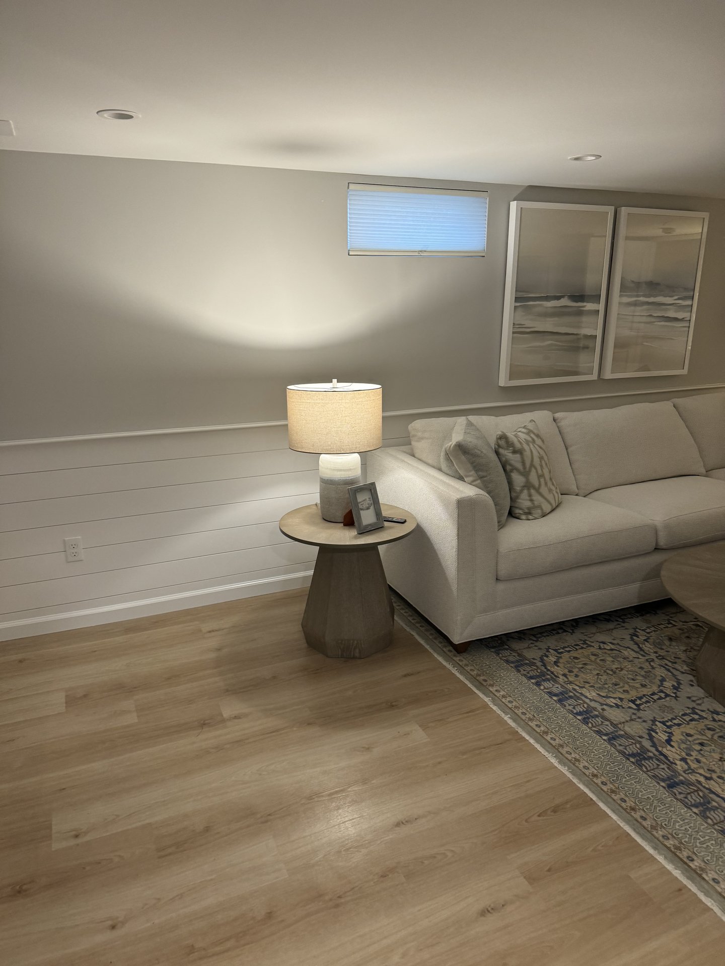 Finished living space with new flooring and trim