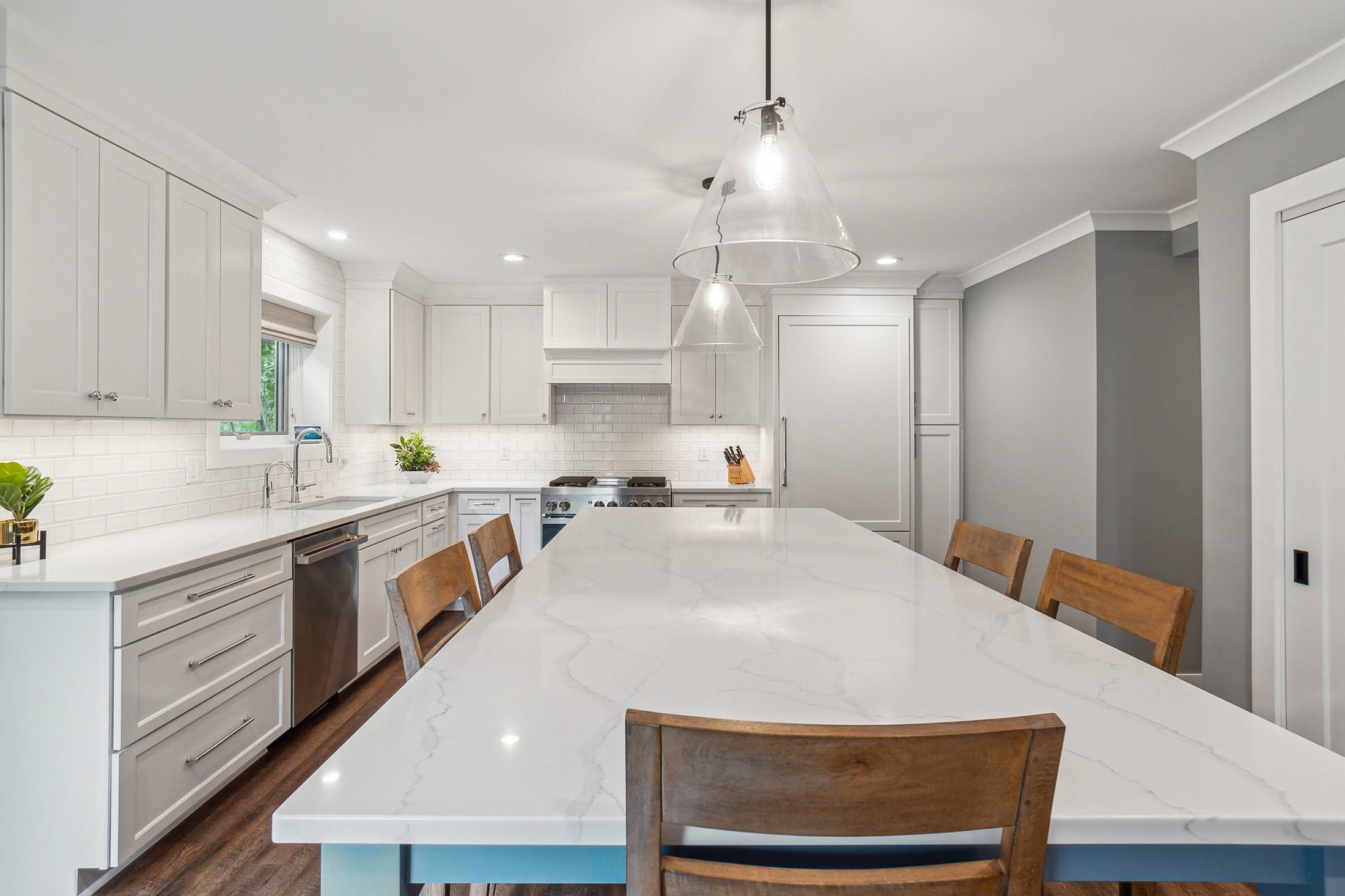 White kitchen with oversized island, Ann Arbor