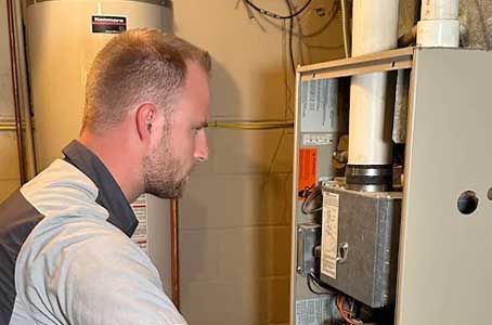 Plumbing Today technician servicing a furnace