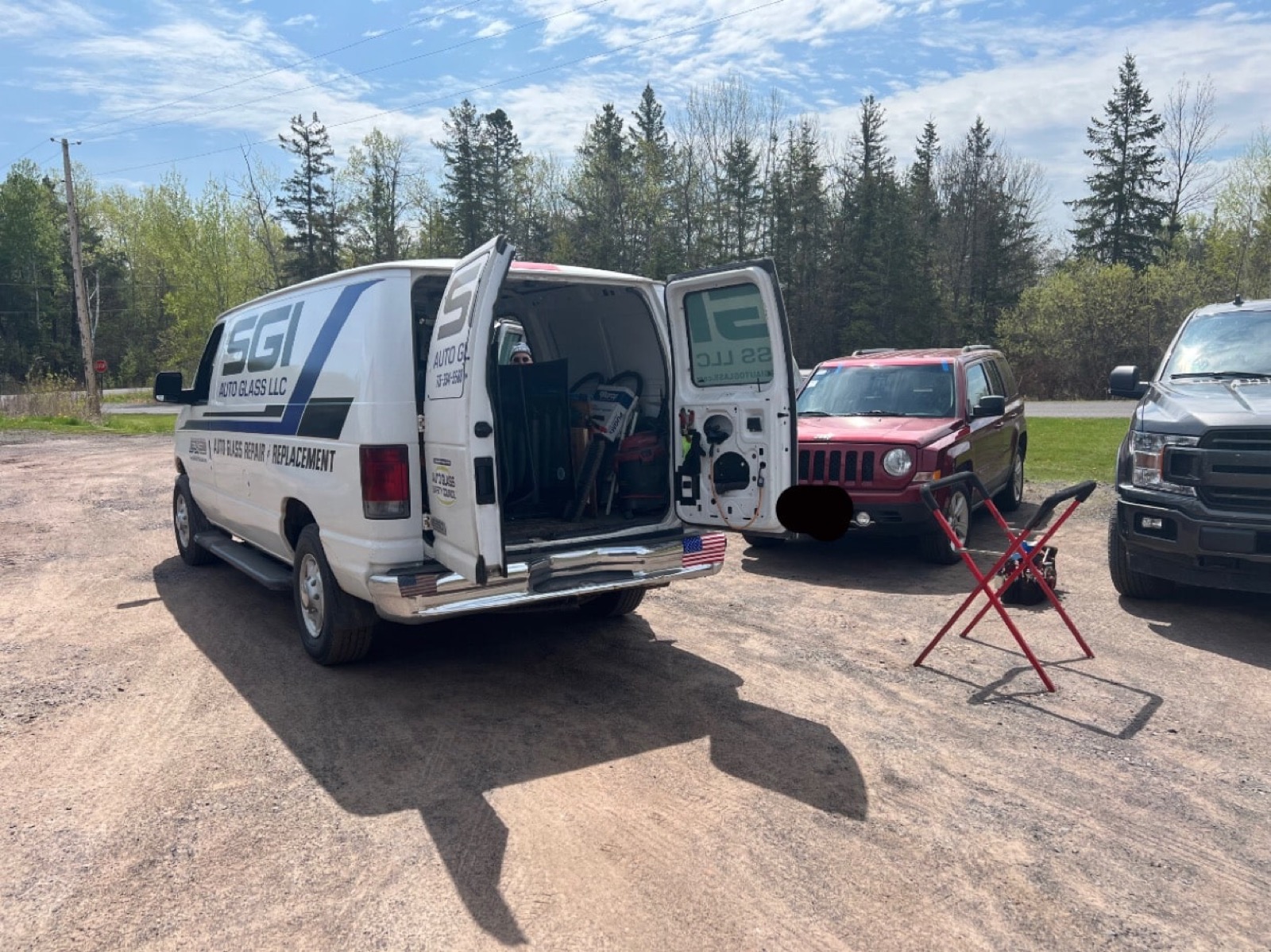SGI Auto Glass service van on a mobile job
