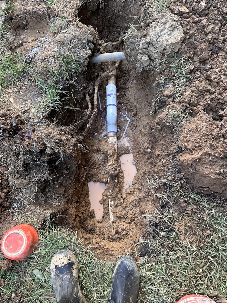 Line repair in an excavated trench